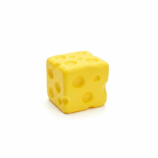 Yellow cheese block squishy stress relief toy on white background